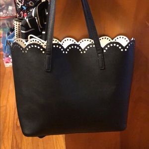 Scalloped black handbag